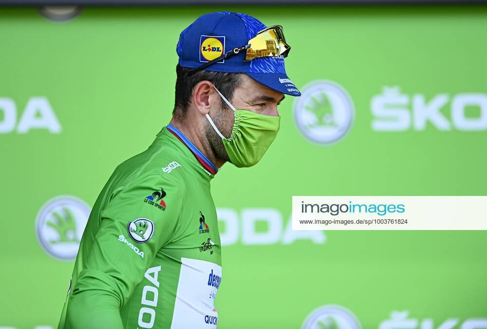 CARCASSONNE, FRANCE - JULY 09 : CAVENDISH Mark (GBR) of DECEUNINCK - QUICK - STEP pictured with the green jersey during the podium ceremony during stage 13 of the 108th edition of the 2021 Tour de France cycling race, a stage of 219,9 kms between Nimes and Carcassonne. on July 9, 2021 in Carcassonne, France, 9 07 2021 CYCLISME : Tour de France 2021 - Etape 13 - Nimes to Carcassonne - 09 07 2021 PHOTONEWS PANORAMIC