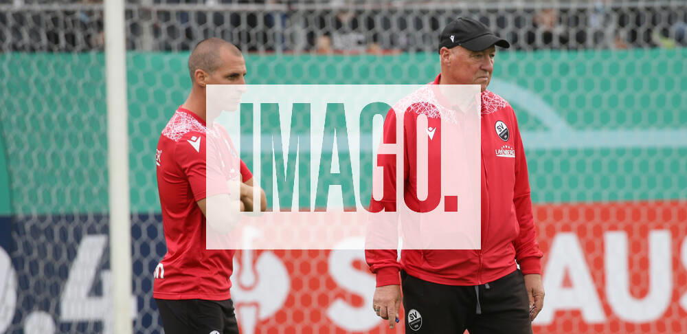 Sandhausen , Football DFB Pokal SV Sandhausen vs RB Leipzig , from left Stefan Kulovits Gerhard Kleppinger Coach Sandhausen According to the specifications of the DFB German Football Association is prohibited in the stadium and or from the game made photographs in the form of sequence images and or video-like photo series to exploit or to let exploit