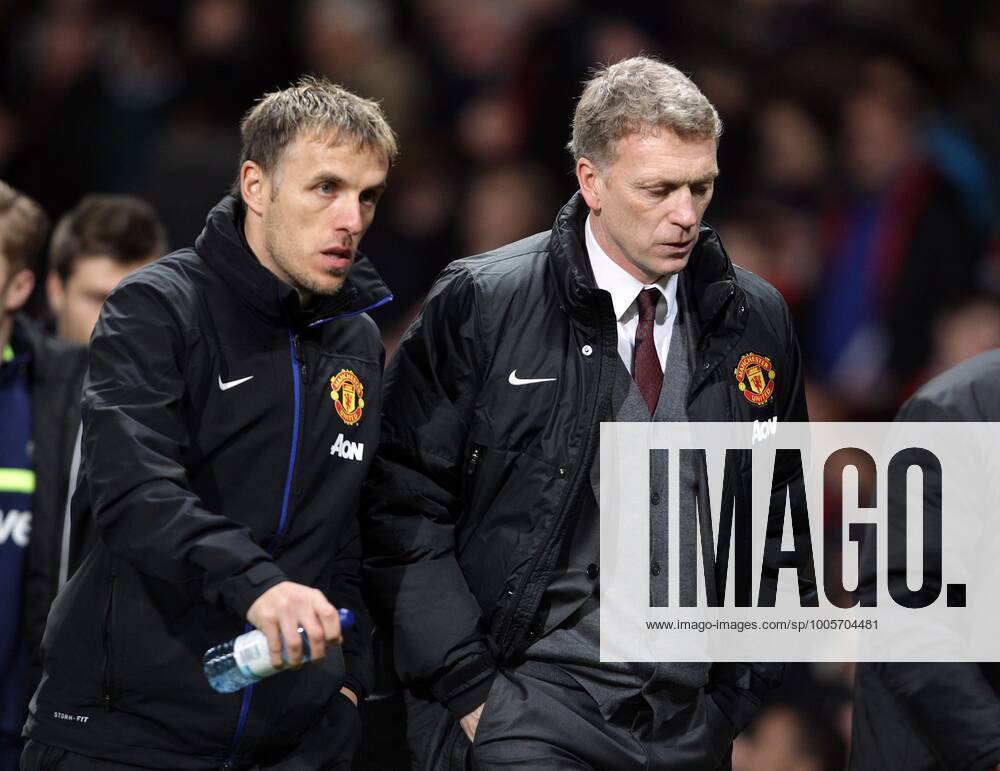 Mandatory Credit: Photo by Ian Hodgson ANL Shutterstock (4416864a) Manchester United, ManU V Sunderland Capital One Cup Semi Final Second Leg Man United Manager David Moyes With Phil Neville After Defeat Picture By Ian Hodgson daily Mail Manchester United V Sunderland Capital One Cup Semi Final Second Leg Man United Manager David Moyes With Phil Neville After Defeat Picture By Ian Hodgson daily Mail No use with unauthorised audio, video, data, fixture lists (outside the EU), club league logos or live services. Online in-match use limited to 45 images (+15 in extra time). No use to emulate moving images. No use in betting, games or single club league player publications services. Manchester United V Sunderland Capital One Cup Semi Final Second Leg Man United Manager David Moyes With Phil Neville After Defeat Picture By Ian Hodgson daily Mail No use with unauthorised audio, video, data, fixture lists (outside the EU), club league logos or live services. Online in-match use limited to 45 images (+15 in extra time). No use to emulate moving images. No use in betting, games or