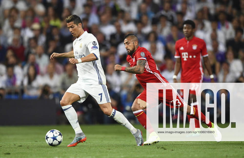 Mandatory Credit: Photo by Javier Garcia BPI Shutterstock (8617689dd) Arturo Vidal of Bayern Munich chases Cristiano Ronaldo of Real Madrid during the UEFA Champions League Quarter Final second leg match between Real Madrid and Bayern Munich played at the Estadio Santiago Bernabeu, Madrid on 18th April 2017 Football - UEFA Champions League 2016 17 Quarter Final Second Leg Real Madrid v Bayern Munich Santiago Bernabéu Stadium, Madrid, Spain - 18 Apr 2017 No use with unauthorised audio, video, data, fixture lists, club league logos or live services. Online in-match use limited to 75 images, no video emulation. No use in betting, games or single club league player publications. Football - UEFA Champions League 2016 17 Quarter Final Second Leg Real Madrid v Bayern Munich Santiago Bernabéu Stadium, Madrid, Spain - 18 Apr 2017 No use with unauthorised audio, video, data, fixture lists, club league logos or live services. Online in-match use limited to 75 images, no video emulation. No use in betting, games or single club league player publications.