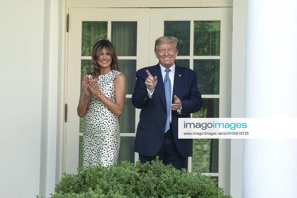 United States President Donald J. Trump and First lady Melania Trump stop to applaud after delivering remarks during a Presidential Recognition Ceremony on Hard Work, Heroism, and Hope in the Rose Garden of the White House in Washington D.C., U.S. on Friday, May 15, 2020. Credit: CNP Washington USA - ZUMAs152 20200515_zaa_s152_103