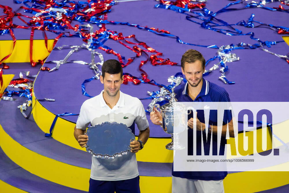 (210913) -- NEW YORK, Sept. 13, 2021 -- Novak Djokovic (L) of Serbia and Daniil Medvedev of Russia pose with their trophies after the men s singles final at the 2021 US Open in New York, the United States, Sept. 12, 2021. (Photo by Xinhua) (SP)U.S.-NEW YORK-TENNIS-US OPEN-MEN S SINGLES-FINAL MichaelxNagle