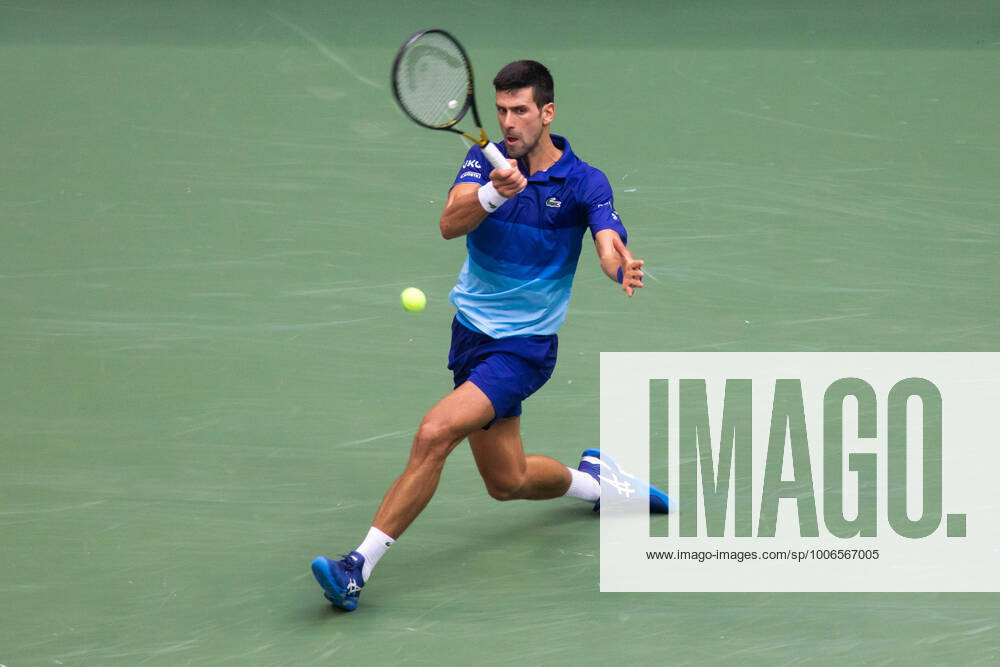 (210913) -- NEW YORK, Sept. 13, 2021 -- Novak Djokovic of Serbia hits a return during the men s singles final between Novak Djokovic of Serbia and Daniil Medvedev of Russia at the 2021 US Open in New York, the United States, Sept. 12, 2021. (Photo by Xinhua) (SP)U.S.-NEW YORK-TENNIS-US OPEN-MEN S SINGLES-FINAL MichaelxNagle