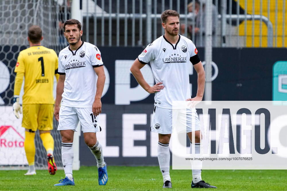 From left Patrick Drewes goalkeeper, SVS, 1 , Bashkim Ajdini SVS, 19 , Immanuel Höhn SVS, 15 , SV Sandhausen player, looking disappointed, disappointment, frustration, disappointed, pessimistic, after conceding goal to 1 3, Action, Action, Game Scene, 03 10 2021, Sandhausen Germany , Football, 2 Bundesliga, SV Sandhausen SV Darmstadt 98, DFB DFL REGULATIONS PROHIBIT ANY USE OF PHOTOGRAPHS AS IMAGE SEQUENCES AND OR QUASI VIDEO