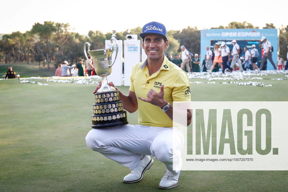 Rafa Cabrera Bello of Spain celebrates the victory with the tournament trophy during the Acciona Open Espana of Golf, Spain Open, at Casa de Campo on October 10, 2021, in Madrid, Spain. MADRID SPAIN - ZUMAa181 20211010_zaa_a181_132