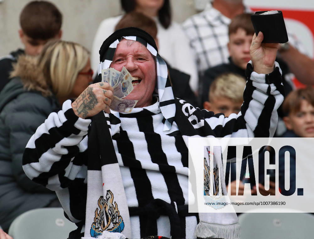 Newcastle, England, 17th October 2021. A Newcastle fan pays homage to the clubs new owners by dressing up and waving money during the Premier League match at St. James s Park, Newcastle. Picture credit should read: Simon Bellis Sportimage . SPI-1251-0028