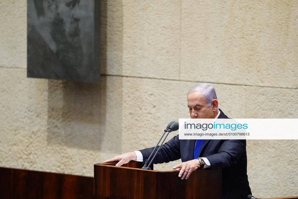 Israeli Prime Minister Benjamin Netanyahu (L) speaks during a swearing in ceremony of his new unity government with election rival Benny Gantz, at the Knesset, Israel s parliament, in Jerusalem on Sunday, May 17, 2020. JERX20200517202 HANDOUT