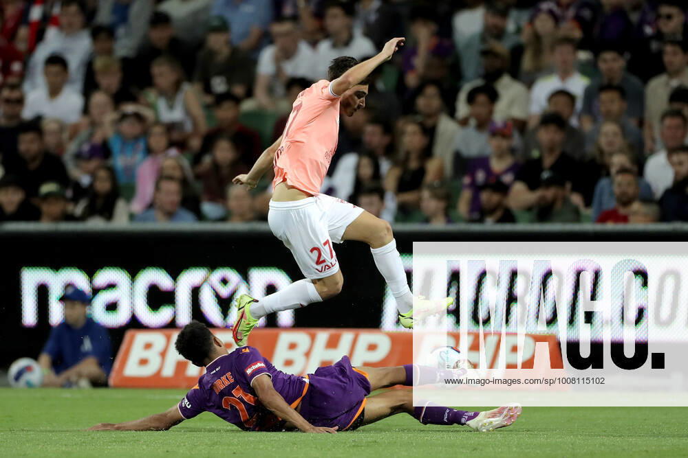 ALEAGUE GLORY ADELAIDE, Josh Cavallo of United is tackled by Antonee Burke-Gilroy of the Glory during the A-League Round 1 match between Perth Glory and Adelaide United at HBF Park in Perth, Saturday, November 20, 2021. ( NO ARCHIVING, , NO USE IN BOOKS WITHOUT CONSENT PERTH WA AUSTRALIA