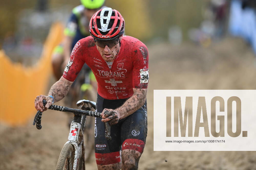Swiss Kevin Kuhn pictured in action during the men s elite race of the 7th stage (out of 16) of the world cup cyclocross, in Koksijde Sunday 21 November 2021. DAVIDxSTOCKMAN x3141230x