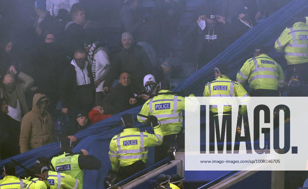 Leicester, England, 25th November 2021. Police draw their batons to keep the Legia Warsaw fans back during the UEFA Europa League match at the King Power Stadium, Leicester. Picture credit should read: Darren Staples Sportimage . SPI-1341-0061
