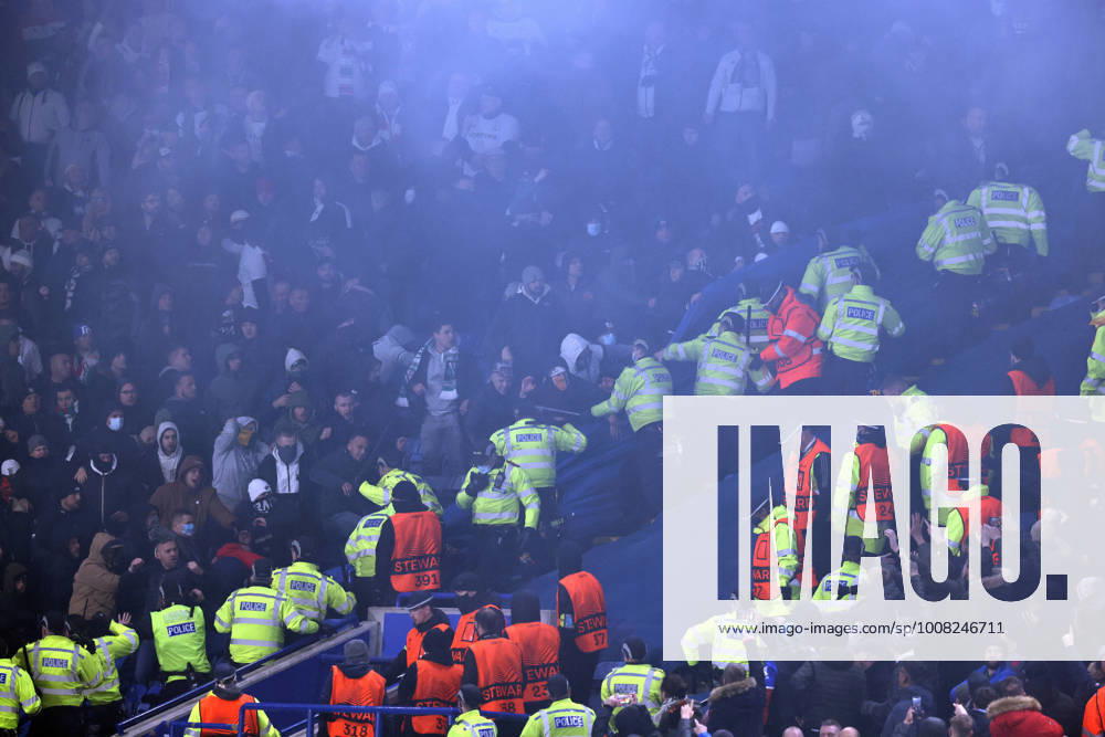Leicester, England, 25th November 2021. Police draw their batons to keep the Legia Warsaw fans back during the UEFA Europa League match at the King Power Stadium, Leicester. Picture credit should read: Darren Staples Sportimage . SPI-1341-0062