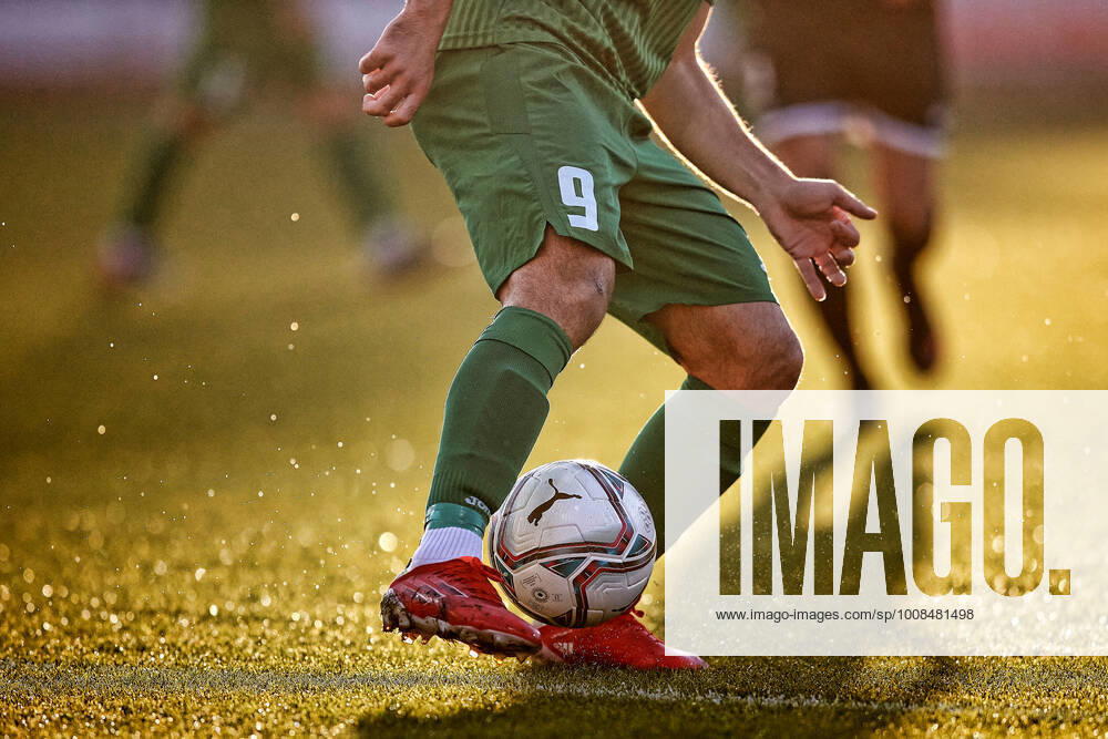 Water droplets are discharged as Kristian Keqi (not in picture) of Floriana tries to control the ball during the Malta BOV Premier League soccer match between Hibernians and Floriana at the National Stadium, Ta Qali, Malta on 05 December 2021 Hibernians v Floriana MPL_21_22