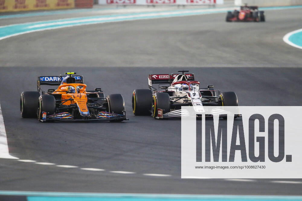 07 RAIKKONEN Kimi (fin), Alfa Romeo Racing ORLEN C41, action and 04 NORRIS Lando (gbr), McLaren MCL35M during the Formula 1 Etihad Airways Abu Dhabi Grand Prix 2021, 22th round of the 2021 FIA Formula One World Championship, WM, Weltmeisterschaft from December 10 to 12, 2021 on the Yas Marina Circuit, in Yas Island, Abu Dhabi - F1 - ABU DHABI GRAND PRIX 2021 - RACE DPPI Panoramic 20211212_GOODEN_FGO00760