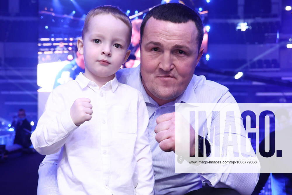 MOSCOW, RUSSIA – DECEMBER 19, 2021: Boxer Denis Lebedev with his son Klim attends the Fight to Save Lives charity combat tournament in support of seriously ill children at the VTB Arena. Valery Sharifulin TASS TS11C6BD