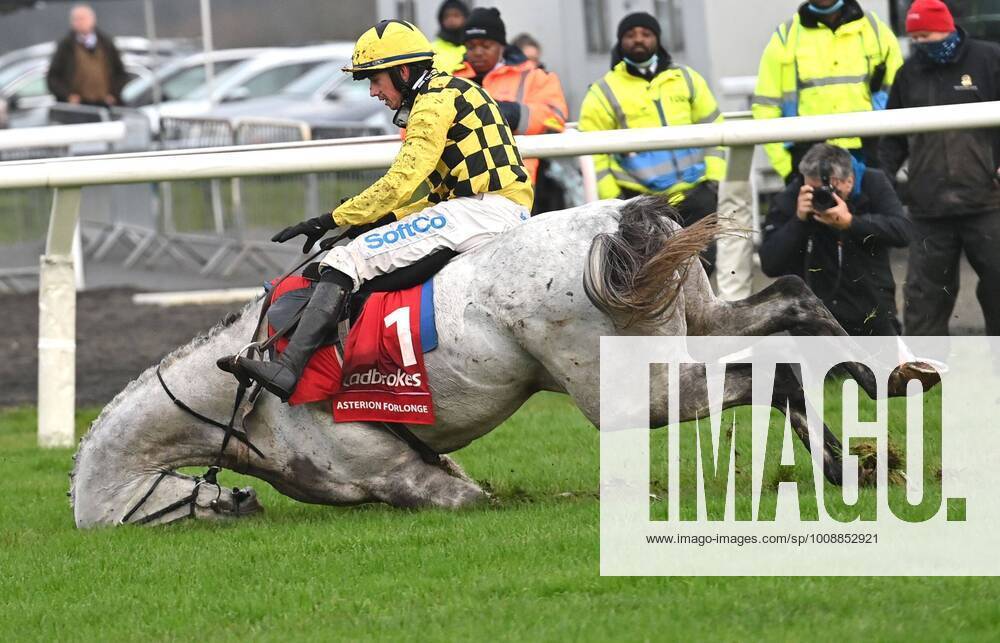 KW51 Mandatory Credit: Photo by Hugh Routledge Shutterstock (12657027x) B.J. Cooper parts company with Asterion Forlonge after taking the last in The Ladbrokes King George Vl Steeple Chase. Photo Hugh Routledge Horse Racing, Christmas Race meeting, Kempton Park, UK - 26 Dec 2021 Horse Racing, Christmas Race meeting, Kempton Park, UK - 26 Dec 2021