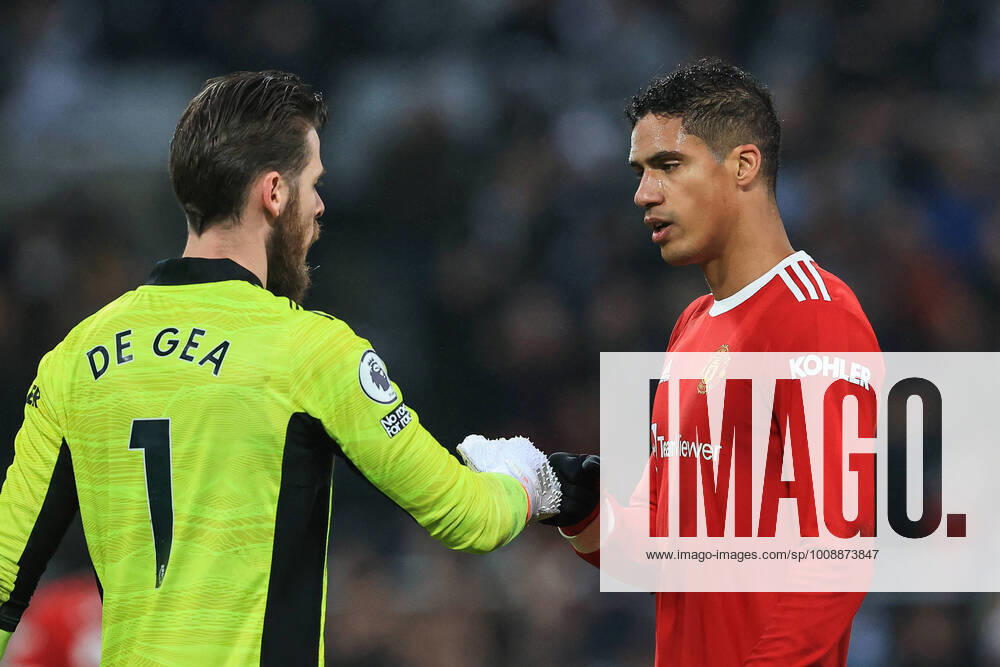 Premier League Newcastle United v Manchester United, ManU David De Gea 1 of Manchester United and team mate RaphaÃ«l Varane 19 bump fists at the end of the game