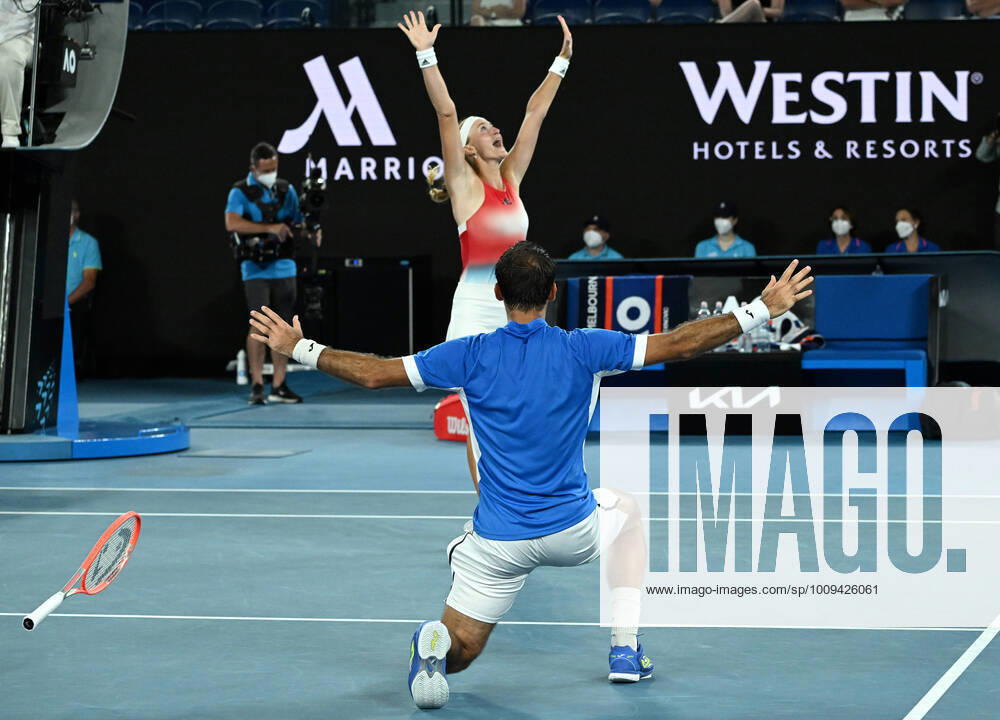 KW04 TENNIS AUSTRALIAN OPEN, Ivan Dodig of Croatia and Kristina Mladenovic of France react after winning their Mixed Doubles Final against Jaimee Fourlis and Jason Kubler of Australia on Day 12 of the Australian Open, at Melbourne Park, in Melbourne, Friday, January 28, 2022. ( NO ARCHIVING, , NO USE IN BOOKS WITHOUT CONSENT MELBOURNE VIC AUSTRALIA