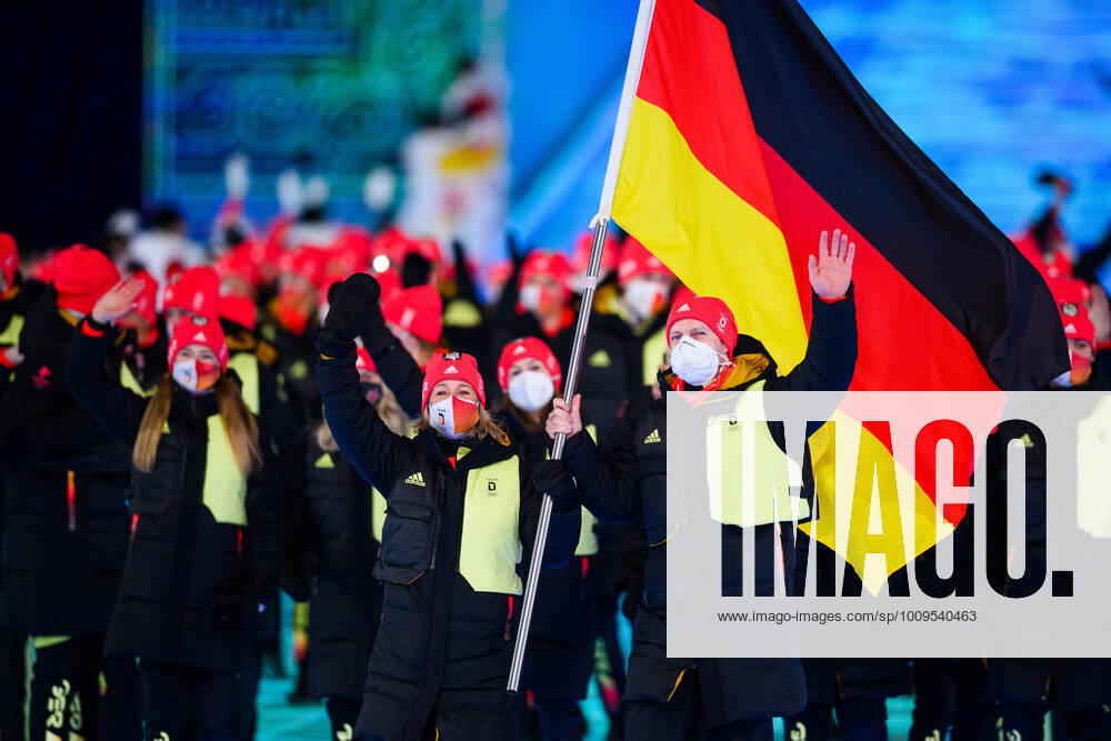 Flag bearers Claudia Pechstein and Francesco Friedrich of Germany during the Opening Ceremony of the 2022 Winter Olympics on February 4, 2022 in Beijing Photo Maxim Thore BILDBYRAN kod MT JM0268 bbeng olympic games olympics winter olympics os ol olympiska spel vinter os olympiske leker peking peking 2022 beijing 2022 beijing 2022 olympic games beijing 2022 winter olympic games peking os beijing ol vinter ol inauguration inauguration ceremony opening ceremony,