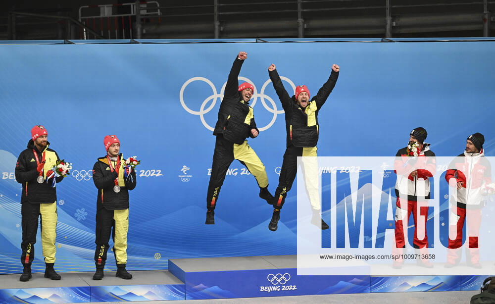 Gold medalists Tobias Wendl and Tobias Arlt of Team Germany, silver medalists Toni Eggert and Sascha Benecken of Team Germany, bronze medalists Thomas Steu and Lorenz Koller of Austria celebrate at a flower ceremony for the Luge Doubles Run 2 on day five of the Beijing 2022 Winter Olympic Games, Olympische Spiele, Olympia, OS at Yanqing National Sliding Centre on February 9, 2022 in Beijing, China.