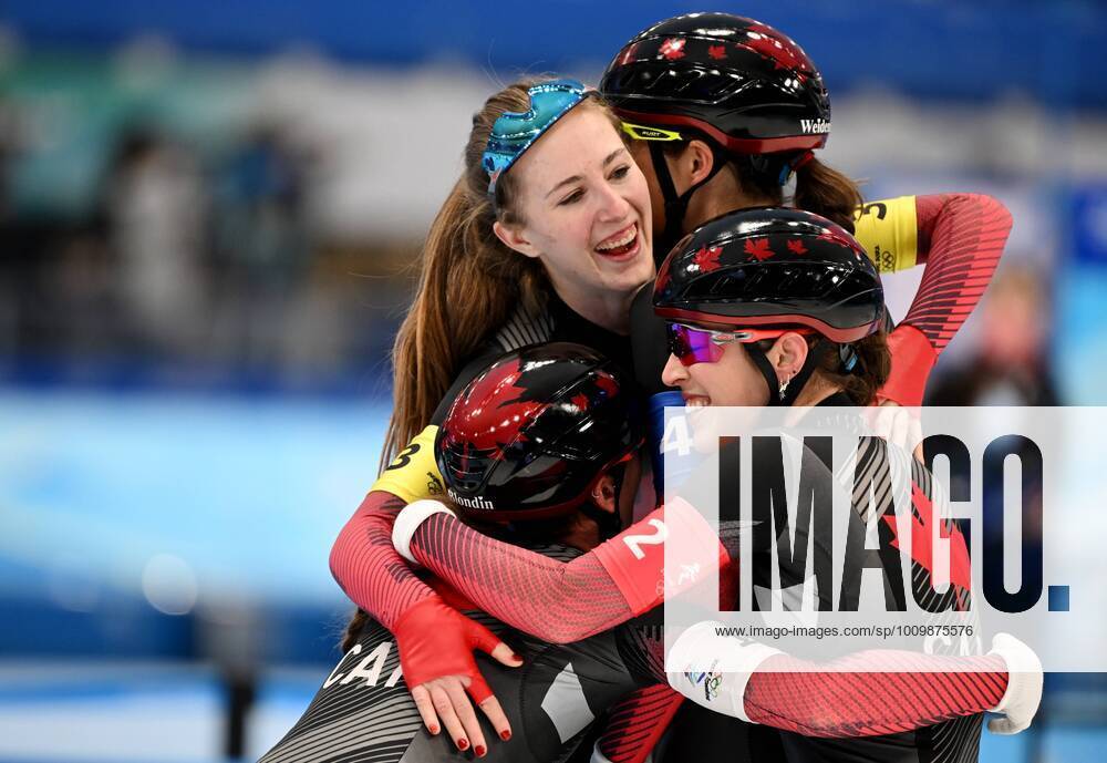 KW 07 China Olympics 2022 Speed skating, Eisschnelllauf Women Team Pursuit 8115249 15.02.2022 Canada s Ivanie Blondin, Alexa Scott, Isabelle Weidemann and Valerie Maltais celebrate winning the women s speed skating team pursuit final during the Beijing 2022 Winter Olympic Games, Olympische Spiele, Olympia, OS at the National Speed Skating Oval in Beijing, China. Vladimir Astapkovich Sputnik Beijing China