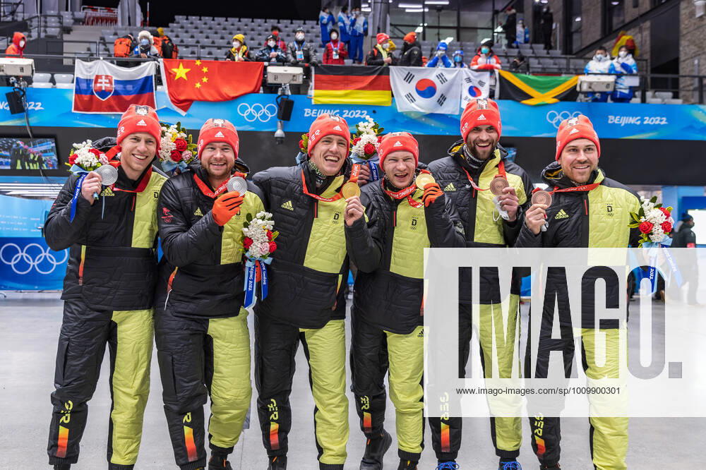 CHN, Winter Olympics, Beijing 2022 15 02 2022, National Sliding Centre, Yanqing, CHN, Winter Olympics, Beijing 2022, Bobsleigh, Two-man bobsleigh, Men, Medal Ceremony, in picture from l Silver medalist Johannes Lochner with Florian Bauer GER , Gold medalist and Olympic champion Francesco Friedrich with Thorsten Margis GER , Bronze medalist Christoph Hafer with Matthias Sommer GER Left to right Silver medalist Johannes Lochner with Florian Bauer of Germany Gold medalist and Olympic champion Francesco Friedrich with Thorsten Margis of Germany Bronze medalist Christoph Hafer with Matthias Sommer of Germany during the Medal Award Ceremony of men Doubles Bobsleigh Competition for the Winter Olympic Games Beijing 2022 National Sliding Centre in Yanqing, China on 2022 02 15 Yanqing China National Sliding Centre