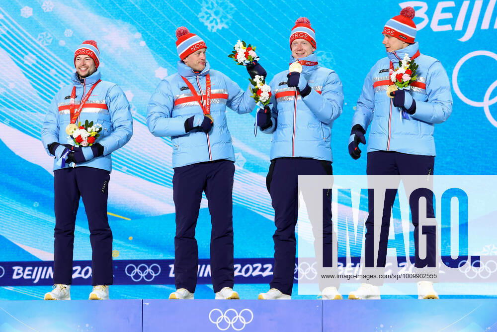 BEIJING 2022, Biathlon, 4x7,5km Staffel MÃ¤nner, Siegerehrung ZHANGJIAKOU, CHINA - FEBRUARY 16, 2022: Athletes Sturla Holm Laegreid, Tarjei Bo, Johannes Bo and Vetle Sjastad Christiansen (L-R) of Norway celebrate their gold medals during the men s biathlon relay victory ceremony at the Medal Plaza as part of the 2022 Winter Olympic Games, Olympische Spiele, Olympia, OS Stanislav Krasilnikov TASS TS123935