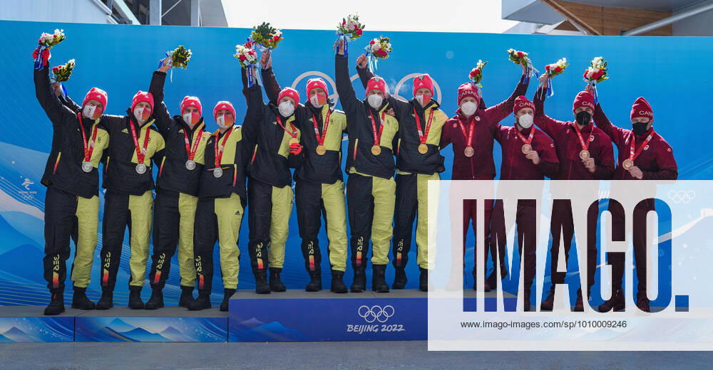 KW 07 (220220) -- BEIJING, Feb. 20, 2022 -- Francesco Friedrich Thorsten Margis Candy Bauer Alexander Schueller (C) of Germany, Johannes Lochner Florian Bauer Christopher Weber Christian Rasp (L) of Germany and Justin Kripps Ryan Sommer Cam Stones Benjamin Coakwell of Canada pose for photos during the awarding ceremony after the bobsleigh 4-man heat of Beijing 2022 Winter Olympics at National Sliding Centre in Yanqing District, Beijing, capital of China, Feb. 20, 2022. ) (BEIJING2022)CHINA-BEIJING-OLYMPIC Winter games, Winterspiele,Spiele, Summer games BOBSLEIGH-4-MEN-HEAT(CN) SunxFei