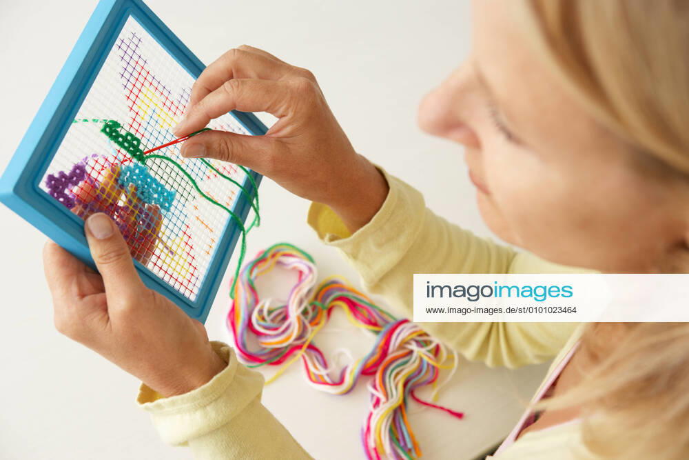 Woman,embroidery,embroidery mmq-hzb,model released, Symbolfoto ,property released