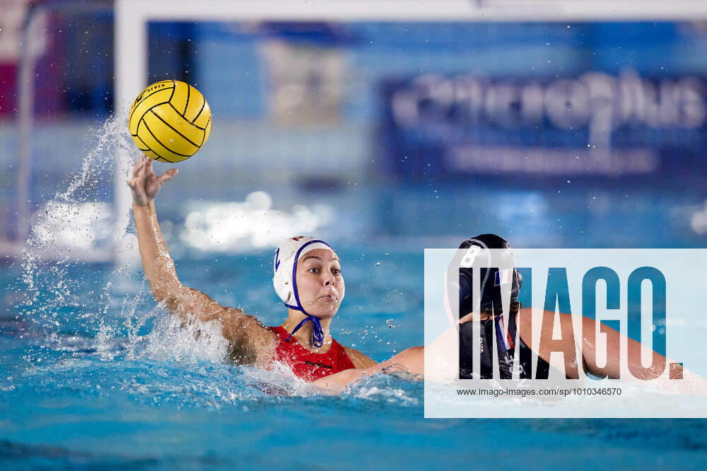 Malta womens Water polo, Wasserball national team, Nationalteam player and captain Karla Camilleri (L) passes the ball despite being confronted by Aurellie Battu (R) of France during the LEN Womens European Water Polo Championships Qualifying Tournament Group C 2022 water polo match between Malta and France at the National Pool, Tal-Qroqq, Malta on 04.03.2022 Womens Water Polo - Malta v France LEN_WOMEN_EQ_2022