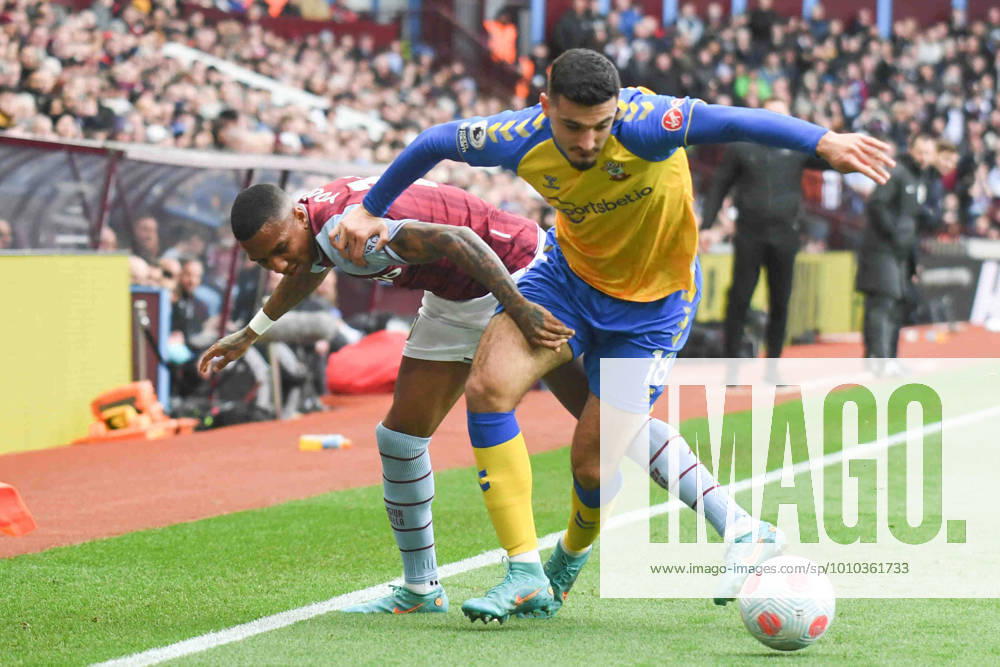Aston Villa v Southampton Premier League 05 03 2022. Southampton FC forward (on loan from Chelsea) Armando Broja (18) battles for possession with Aston Villa defender Ashley Young (18) during the Premier League match between Aston Villa and Southampton at Villa Park, Birmingham, England on 5 March 2022. Birmingham Villa Park West Midlands England Editorial use only DataCo restrictions apply See www.football-dataco.com ,
