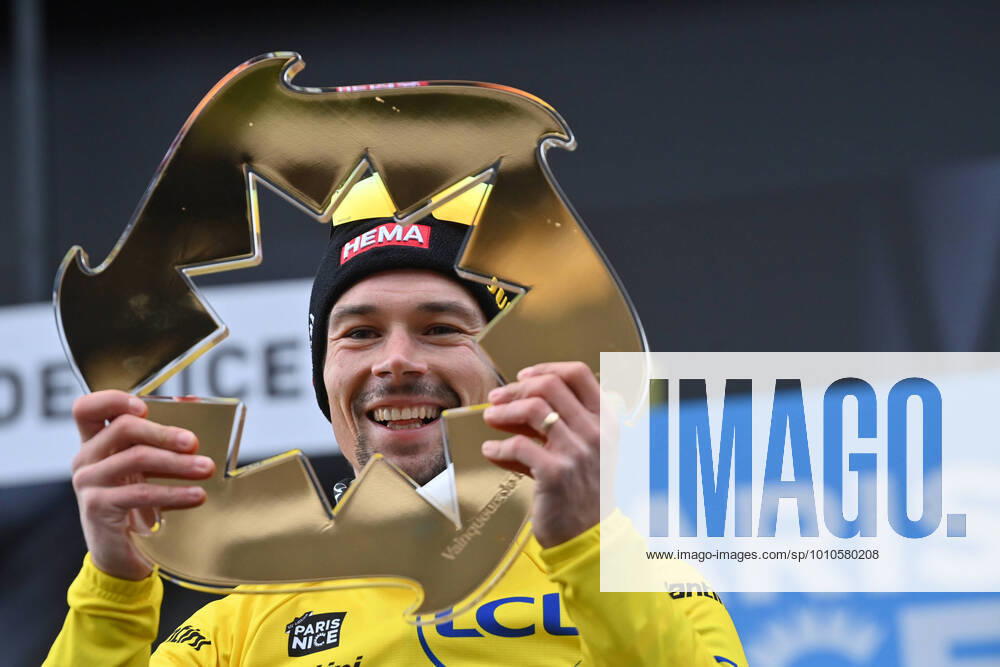 KW10 Slovenian Primoz Roglic of Jumbo-Visma celebrates on the podium after winning the general ranking after stage eight, the final stage of the 80th edition of the Paris-Nice cycling race, from Nice to Nice (115,6 km) in France, Sunday 13 March 2022. DAVIDxSTOCKMAN x21320967x