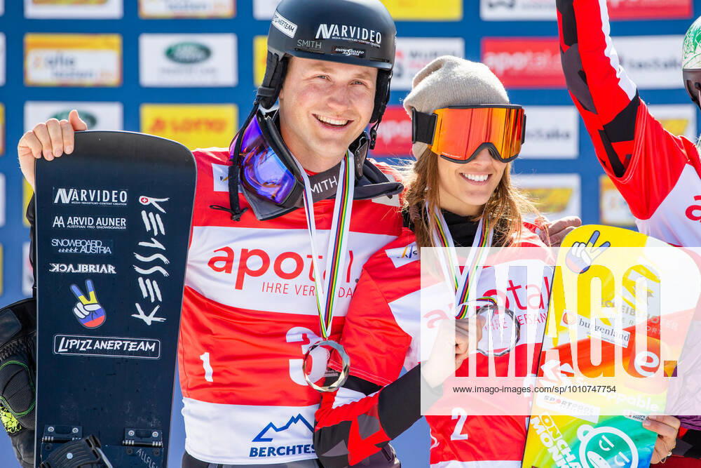 SNOWBOARDING - FIS WC Berchtesgaden BERCHTESGADEN,GERMANY,20.MAR.22 - SNOWBOARDING - FIS World Cup, mixed team event, ladies, men. Image shows Arvid Auner (AUT) and Julia Dujmovits (AUT). GEPAxpictures xGintarexKarpaviciute