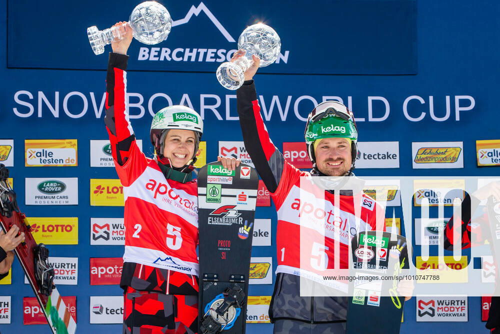 SNOWBOARDING - FIS WC Berchtesgaden BERCHTESGADEN,GERMANY,20.MAR.22 - SNOWBOARDING - FIS World Cup, mixed team event, ladies, men. Image shows Sabine Schoeffmann (AUT) and Alexander Payer (AUT). GEPAxpictures xGintarexKarpaviciute