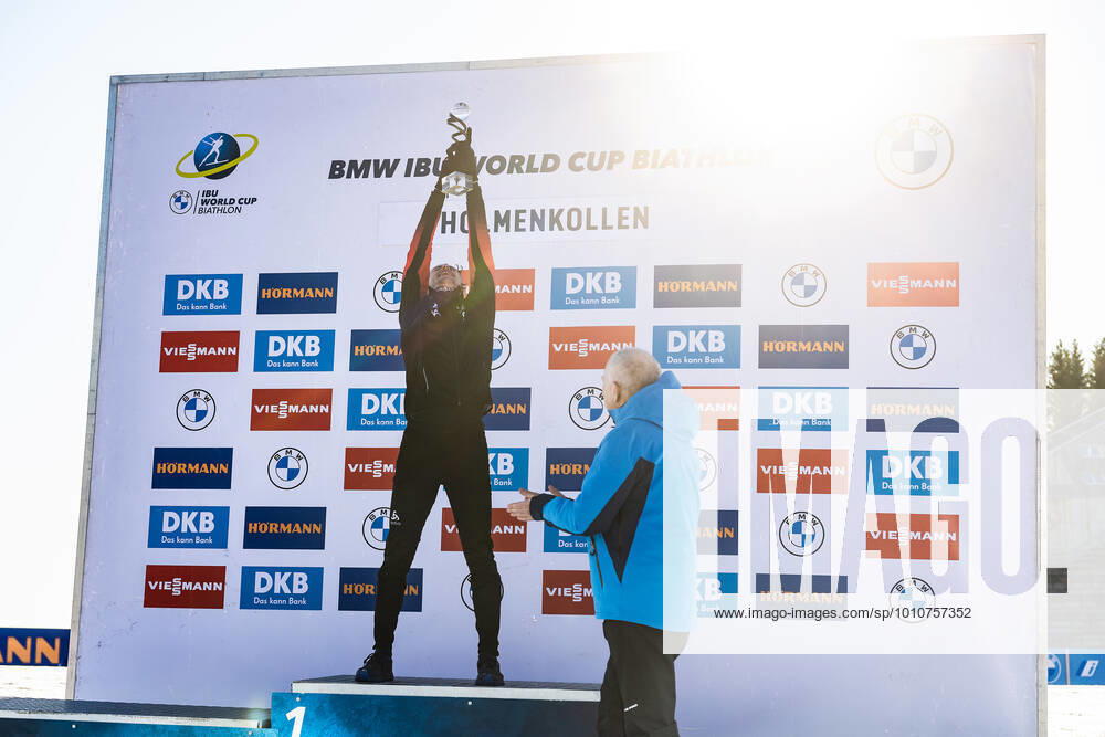 Sturla Holm Laegreid of Norway celebrates with his trophy for best athlete under 25 after competing in men s 15 km biathlon mass start during the IBU World Cup on March 20, 2022 in Oslo Photo Jon Olav Nesvold BILDBYRAN COP 217 JE0053 biathlon biathlon biathlon ibu world cup holmenkollen men s mass start bbeng joint start mass start,
