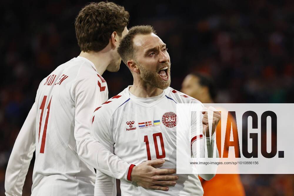 AMSTERDAM lr Andreas Skov Olsen of Denmark, Christian Eriksen of Denmark celebrates 3 2 during the friendly match between the Netherlands and Denmark at the Johan Cruijff ArenA on March 26, 2022 in Amsterdam, Netherlands ANP MAURICE VAN STEEN International Friendly 2021 2022 ANPxSportx IVx 446139147 originalFilename: 446139147