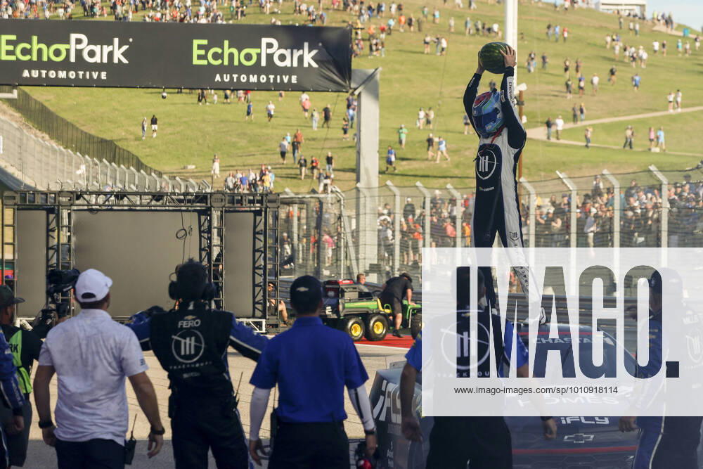 KW12 AUSTIN, TX - MARCH 27: Ross Chastain ( 1 TrackHouse Racing ONX Homes iFly Chevrolet) holds a watermelon above his head after winning the NASCAR, Motorsport, USA Cup Series EchoPark Automotive Grand Prix on March 27, 2022 at Circuit of The Americas in Austin, Texas. (Photo by Matthew Pearce Icon Sportswire) AUTO: MAR 27 NASCAR Cup Series - EchoPark Automotive Grand Prix Icon1692203279858