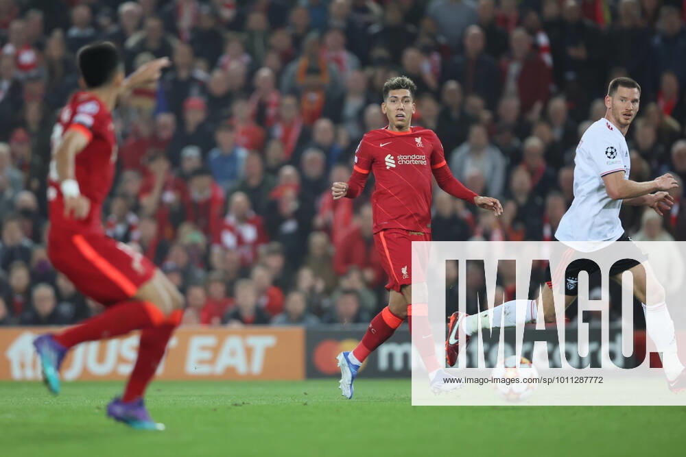 Liverpool v S L Benfica - UEFA Champions League Roberto Firmino of Liverpool passes to Luis Diaz of Liverpool during the UEFA Champions League match between Liverpool and S L Benfica at Anfield, Liverpool on Wednesday 13th April 2022. Liverpool United Kingdom