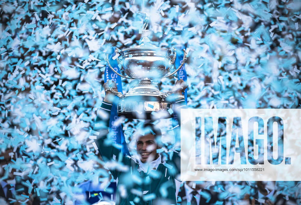 Confetti rains down as Carlos ALCARAZ (ESP) hoists the trophy after winning the final of the Barcelona Open Banc Sabadell 2022 tennis tournament against Pablo Carreno Busta (ESP). Alcaraz wins 6:3, 6:2 Barcelona Spain - ZUMAo105 20220424_zap_o105_048