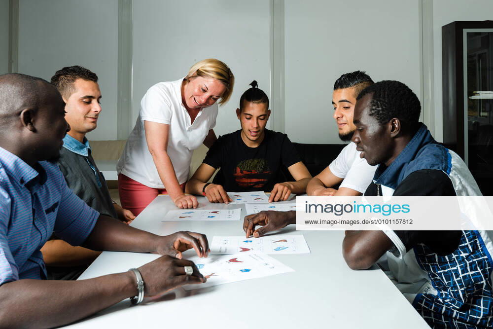 Integration,teaching,migration,refugees qcf-frn,model released, Symbolfoto