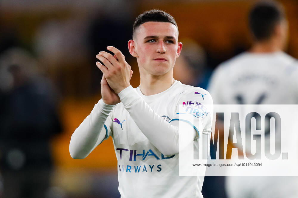 11th May 2022; Molineux Stadium, Wolverhampton, West Midlands, England; Premier League Football, Wolverhampton Wanderers versus Manchester City: Phil Foden of Manchester City applauds the travelling Manchester City fans after the final whistle ActionPlus12389150 GrahamxWilson Content restricted for UK based newspaper