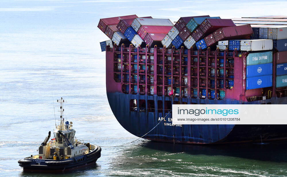 SINGAPORE CONTAINER SHIP BRISBANE, Fallen shipping containers can be seen on the Singapore-flagged container ship APL England as she docks at the Port of Brisbane, Wednesday, May 27, 2020. An investigation is underway into the loss of 40 shipping containers from a tanker in heavy seas off the New South Wales coast. ( NO ARCHIVING, , NO USE IN BOOKS WITHOUT CONSENT BRISBANE QLD AUSTRALIA