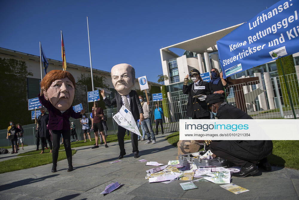Campact activists and other demonstrators protest against rescue aid for the airline Lufthansa in front of the Chancellors Office in Berlin on 27 May 2020