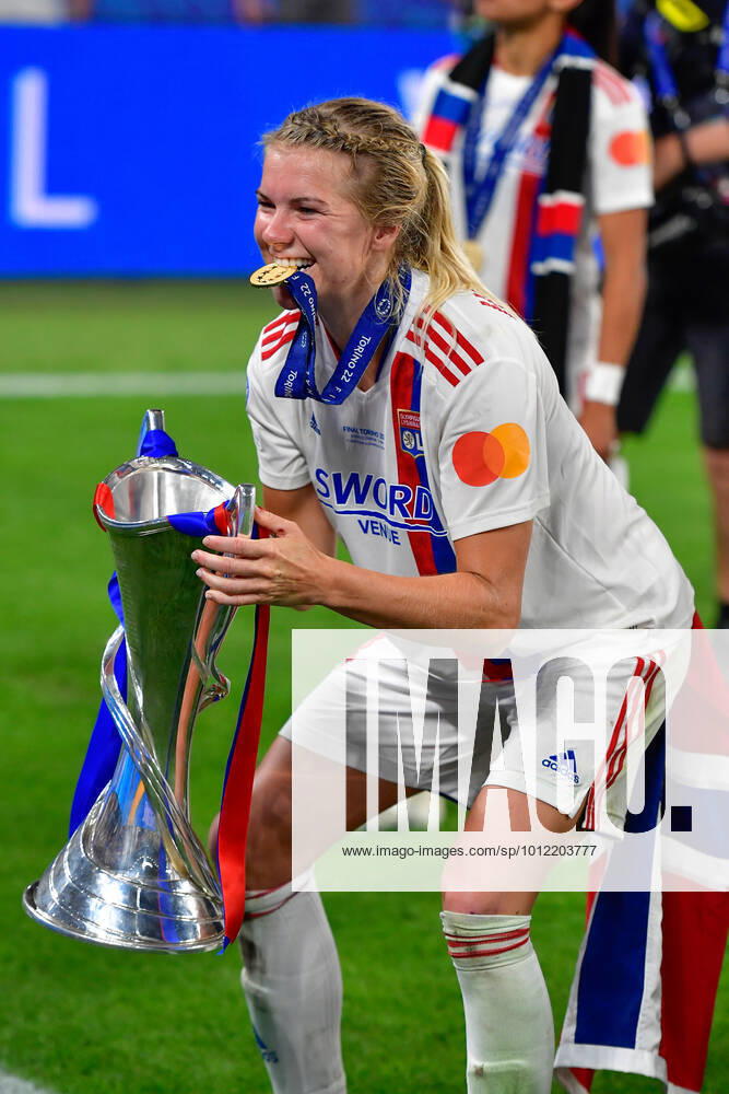 FC Barcelona, Barca v Olympique Lyon, UEFA Women?s Champions League final, football, Turin, Italy Turin, Italy. 21st, May 2022. Ada Hegerberg (14) of Olympique Lyon is celebrating and seen with the Champions League trophy after the UEFA Women?s Champions League final between Barcelona and Olympique Lyon at Juventus Stadium in Turin. Turin Italy