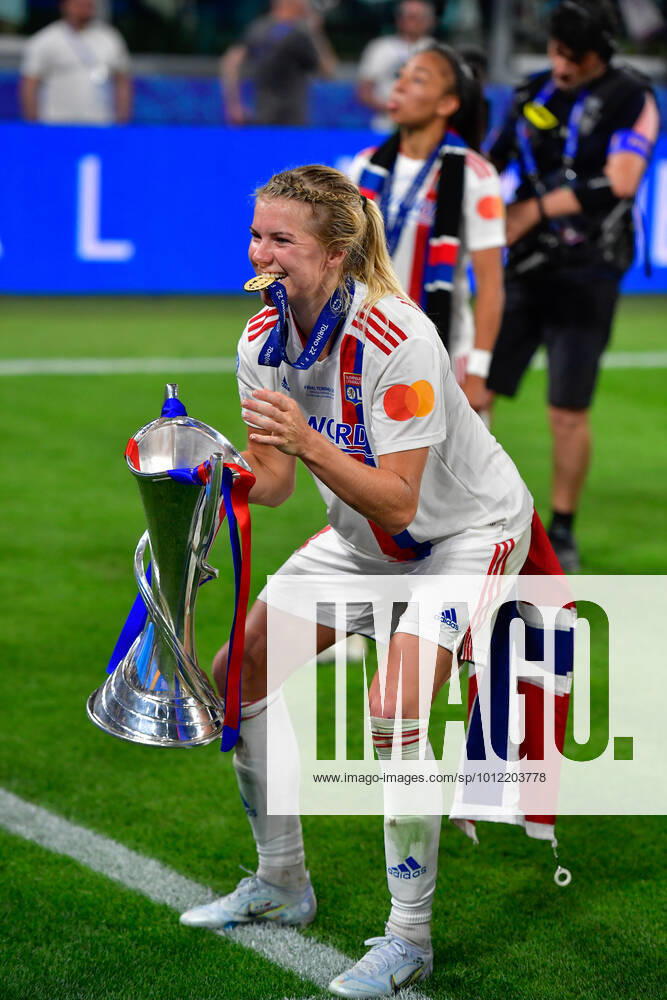 FC Barcelona, Barca v Olympique Lyon, UEFA Women?s Champions League final, football, Turin, Italy Turin, Italy. 21st, May 2022. Ada Hegerberg (14) of Olympique Lyon is celebrating and seen with the Champions League trophy after the UEFA Women?s Champions League final between Barcelona and Olympique Lyon at Juventus Stadium in Turin. Turin Italy