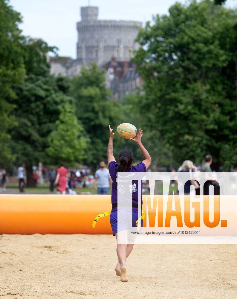 Mandatory Credit: Photo by Sandra Mailer Shutterstock (12971704a) Windsor Beach Rugby. Mixed -Tag Rugby (non-contact) on the beach. Celebrating The Queens Platinum Jubilee, Beach Rugby in the park with Windsor Castle in the background. Beach Rugby, Alexandra Gardens, Windsor, Berkshire, UK - 03 Jun 2022 Beach Rugby, Alexandra Gardens, Windsor, Berkshire, UK - 03 Jun 2022