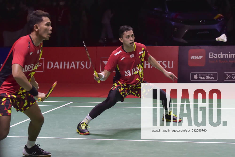 (220612) -- JAKARTA, June 12, 2022 -- Fajar Alfian Muhammad Rian Ardianto (R) of Indonesia compete during the men s doubles final match against Liang Weikeng Wang Chang of China at Daihatsu Indonesia Masters 2022 at the Istora Senayan sports stadium in Jakarta, Indonesia, on June 12, 2022. ) (SP)INDONESIA-JAKARTA-BADMINTON-DAIHATSU INDONESIA MASTERS 2022-MEN S DOUBLES-FINAL VerixSanovri