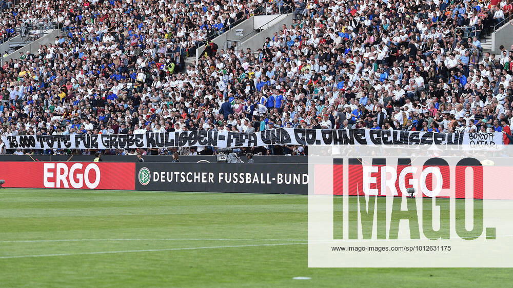 Soccer UEFA Nations League Germany Italy on 14 06 2022 at Borussia Park in Mönchengladbach banner in Germany fan block with the inscription 15 000 dead for great scenery FIFA and Co without conscience boycott Qatar Qatar DFB regulations prohibit any use of photographs as image sequences and or quasi video