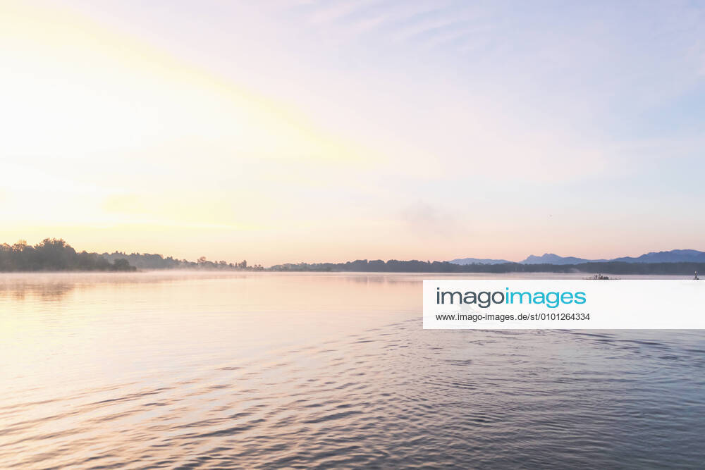 Kayaker in the morning on a lake, Germany model released Symbolfoto MMAF01309