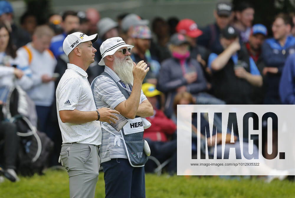 2nd July 2022, Mount Juliet Golf & Spa Hotel, Thomastown, County Kilkenny, Republic of Ireland: Horizon Irish Open Golf, 3rd round; Lucas Herbert of Australia waits on the 4th green as James Morrison of England looks for a ruling ActionPlus12404228 PeterxFitzpatrick