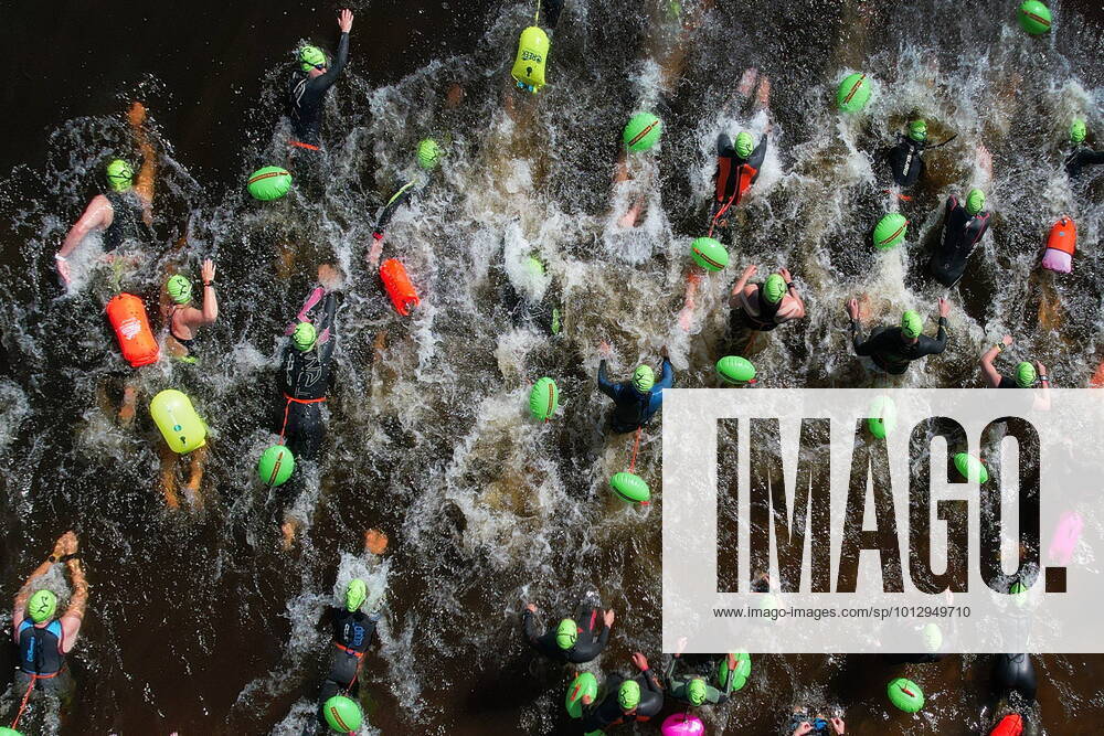 KW26 IVANOVO REGION, RUSSIA - JULY 3, 2022: The Swimcup - Volga 2022 open-water swimming competition takes place in the town of Kineshma, 86km northeast of Ivanovo. Swimmers compete in three events at distances of 1,500 and 5,000m, with a flipper swim of 5,000m. Vladimir Smirnov TASS TS138C43